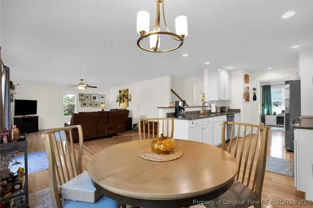a view of a dining room with furniture
