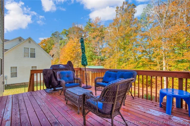 a view of a chairs and table on the wooden floor