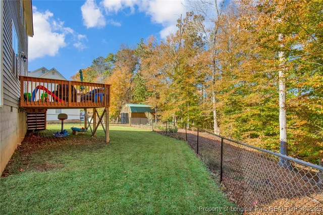 a balcony with table and chairs