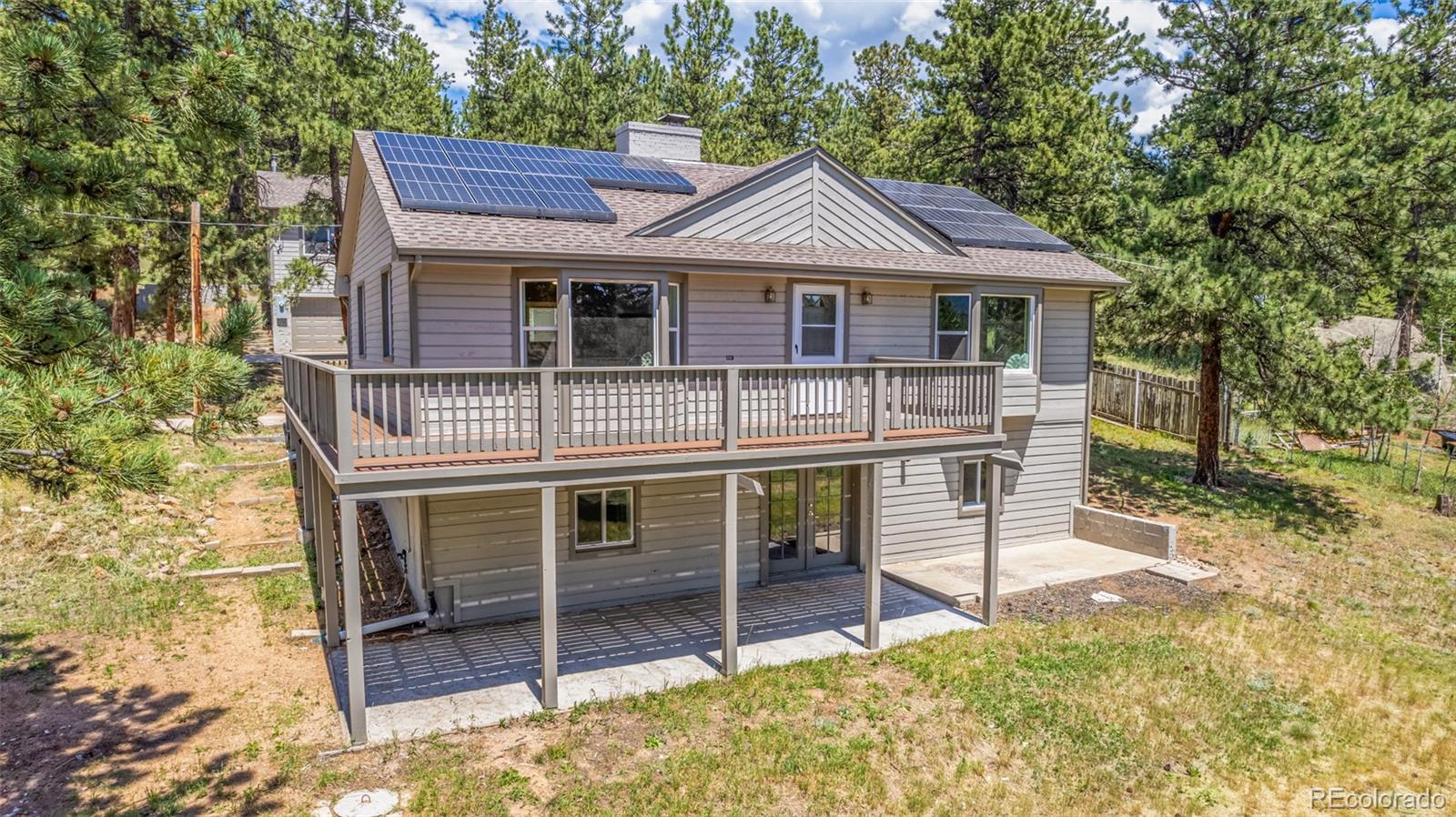 a house that has a table and chairs in it