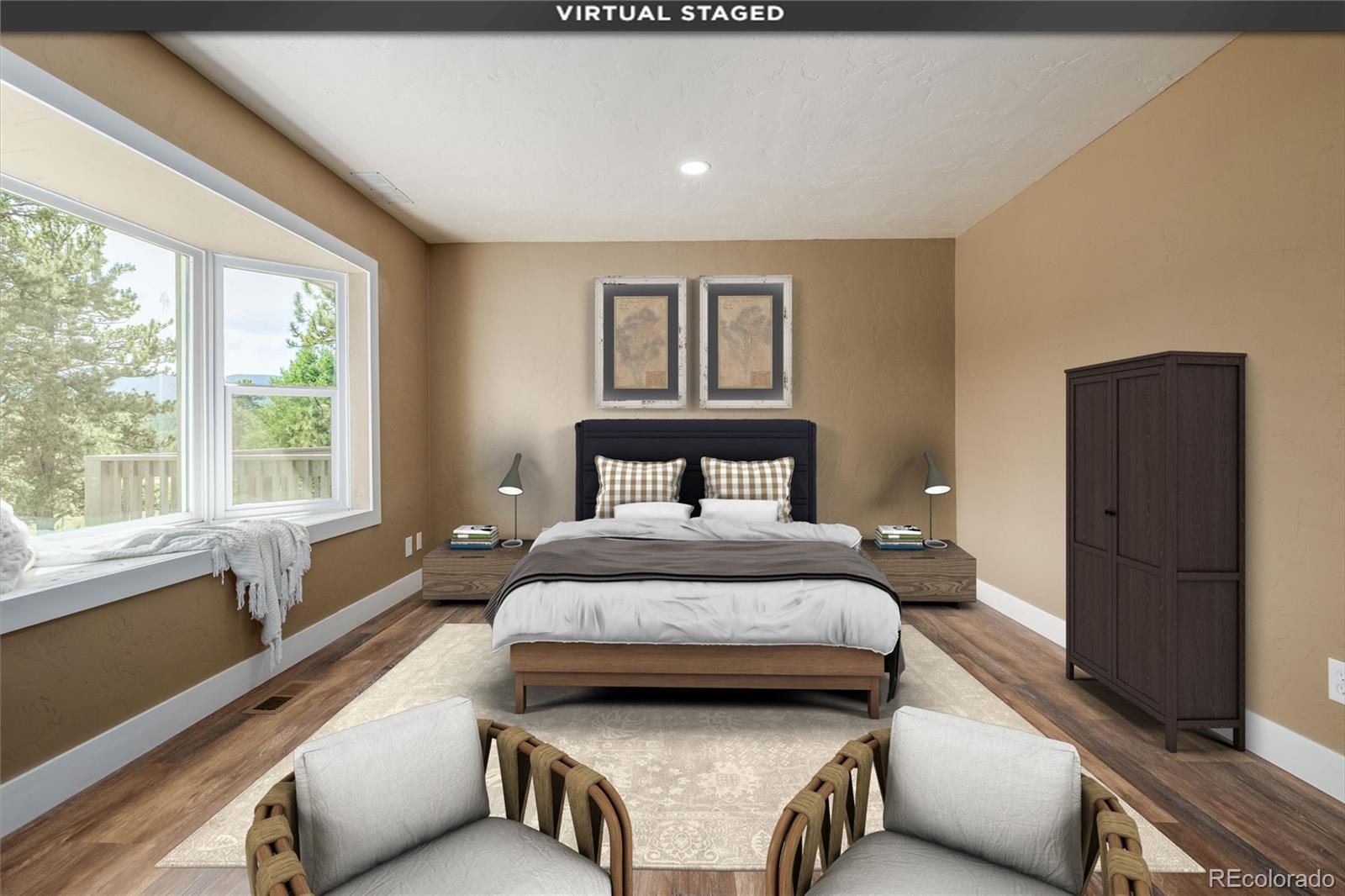 363 Neal Road Bailey, CO 80421 - Photo 11 of 39 a bedroom with a bed and wooden floor