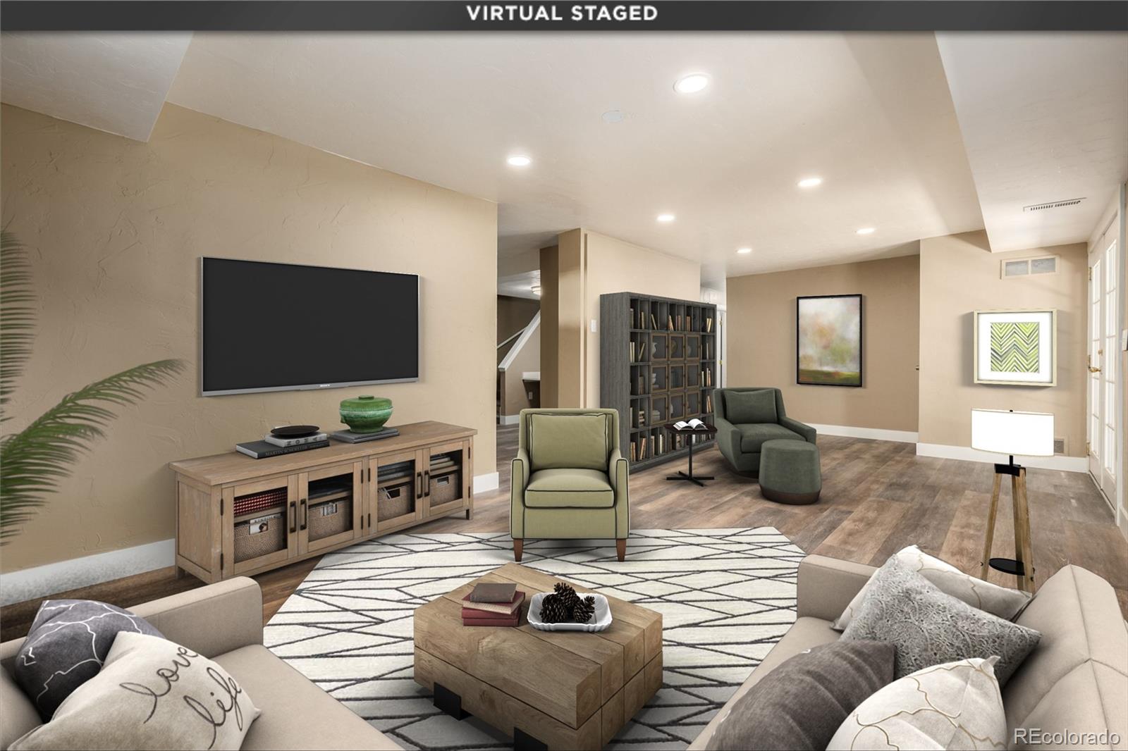 363 Neal Road Bailey, CO 80421 - Photo 15 of 39 a living room with furniture and a flat screen tv