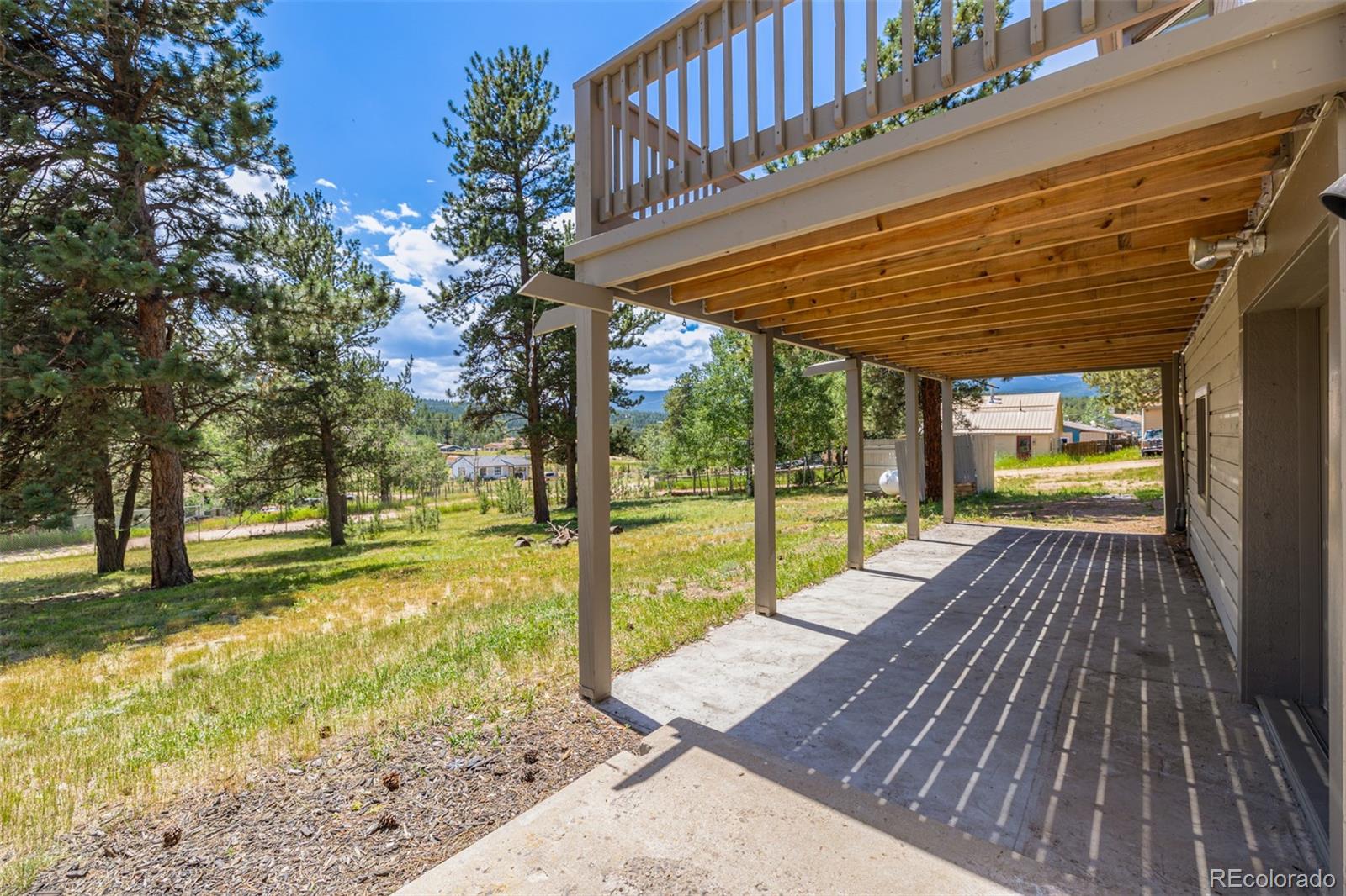 363 Neal Road Bailey, CO 80421 - Photo 31 of 39 a view of swimming pool with seating space