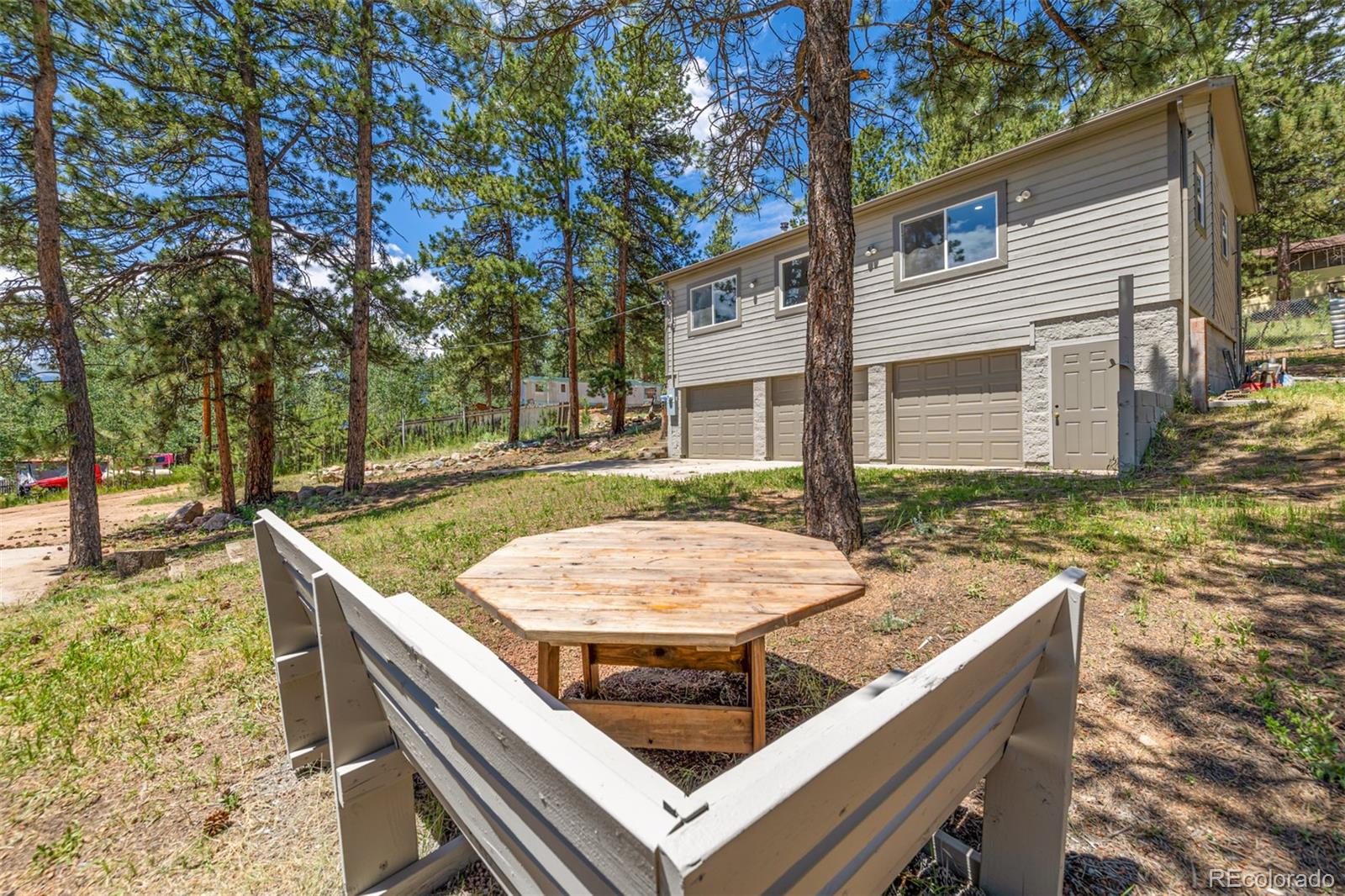 363 Neal Road Bailey, CO 80421 - Photo 32 of 39 a view of outdoor space and seating area