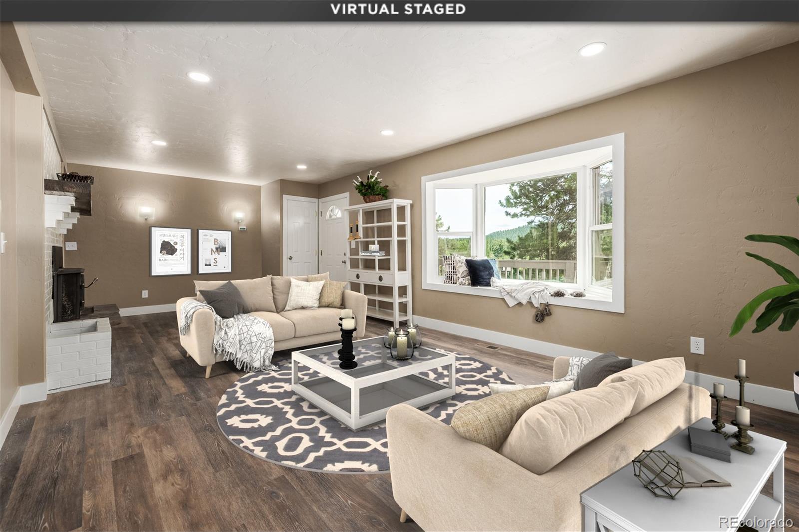 363 Neal Road Bailey, CO 80421 - Photo 4 of 39 a living room with furniture and a large window