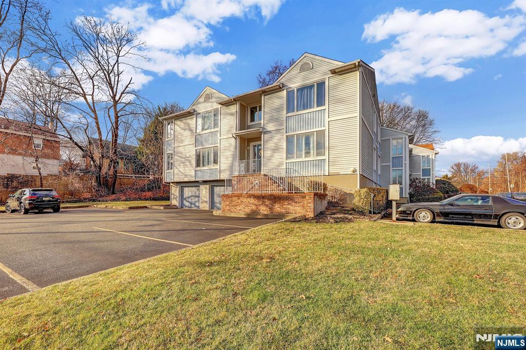 2 Grand Avenue, Unit 2 Hawthorne, NJ 07506 - Photo 2 of 8 a view of a building with a yard