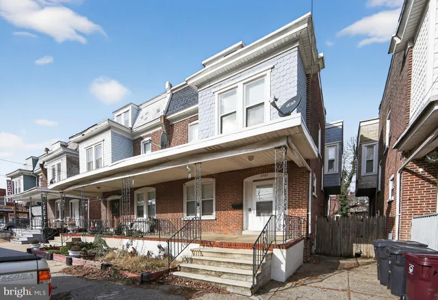 a front view of a building with street view