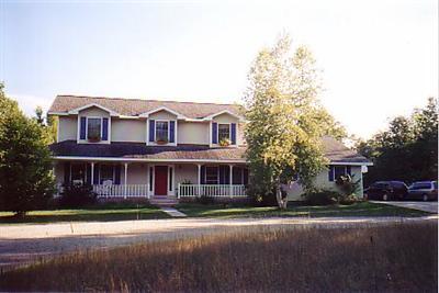 1489 Red Apple Road Manistee, MI 49660 - Photo 1 of 8 Primary Photo