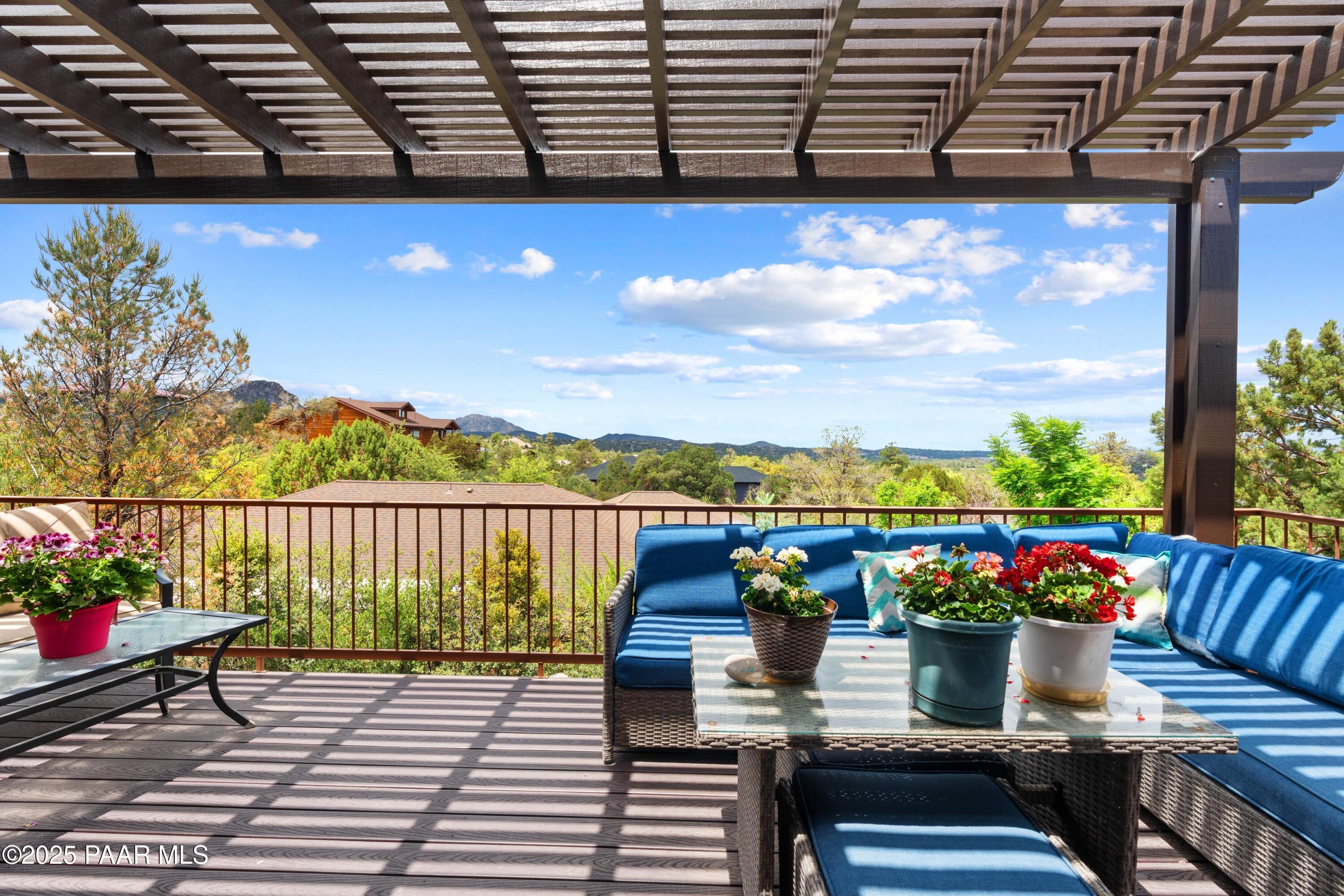 1468 Butte Road Prescott, AZ 86303 - Photo 13 of 31 a view of a balcony with wooden benches