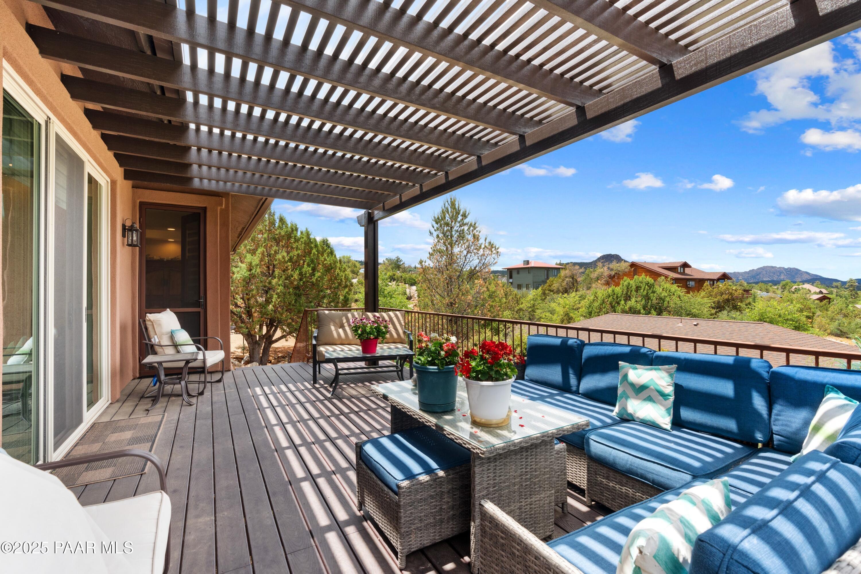 1468 Butte Road Prescott, AZ 86303 - Photo 14 of 31 a view of a living room with furniture and garden view