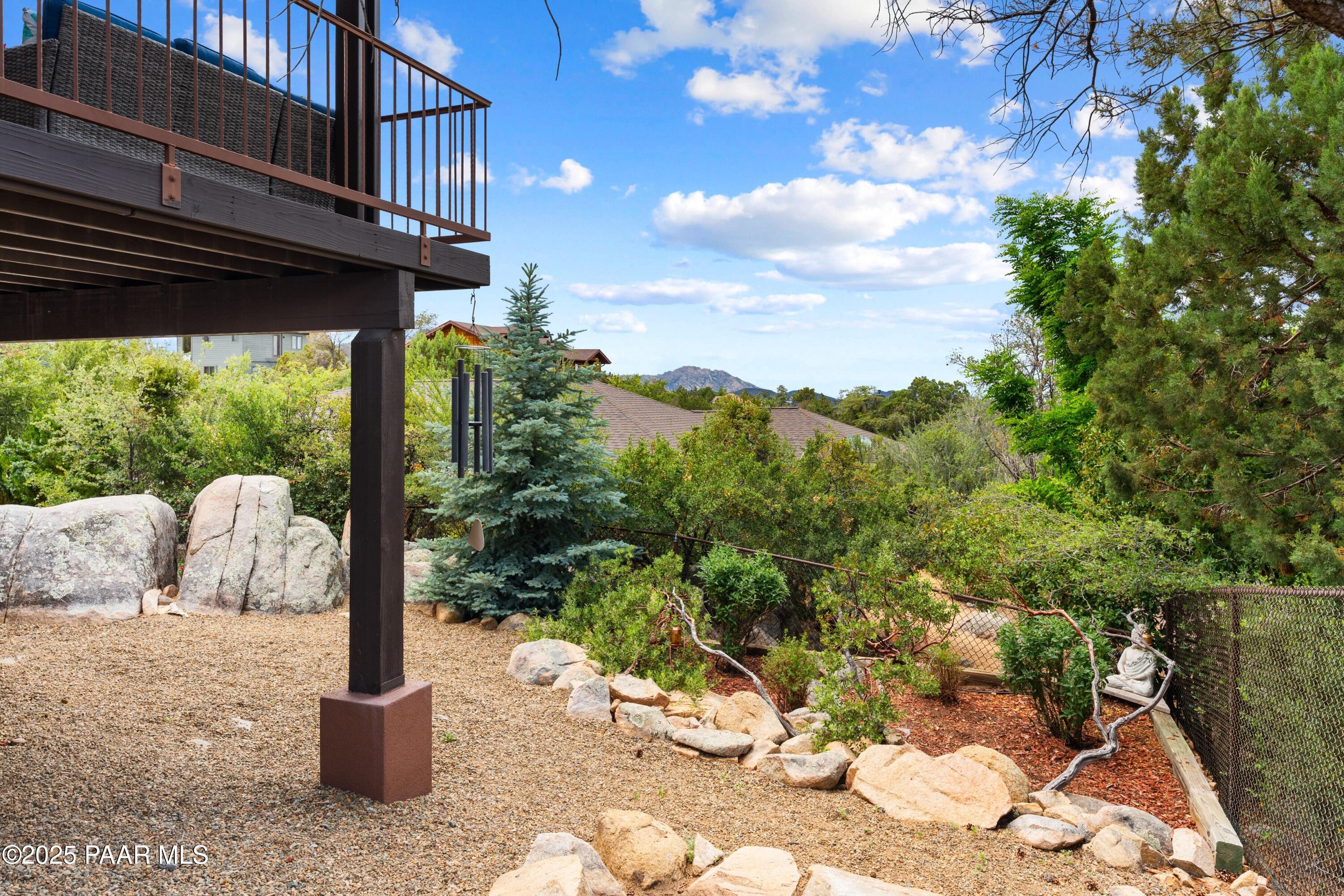 1468 Butte Road Prescott, AZ 86303 - Photo 25 of 31 a view of a porch with furniture and a yard