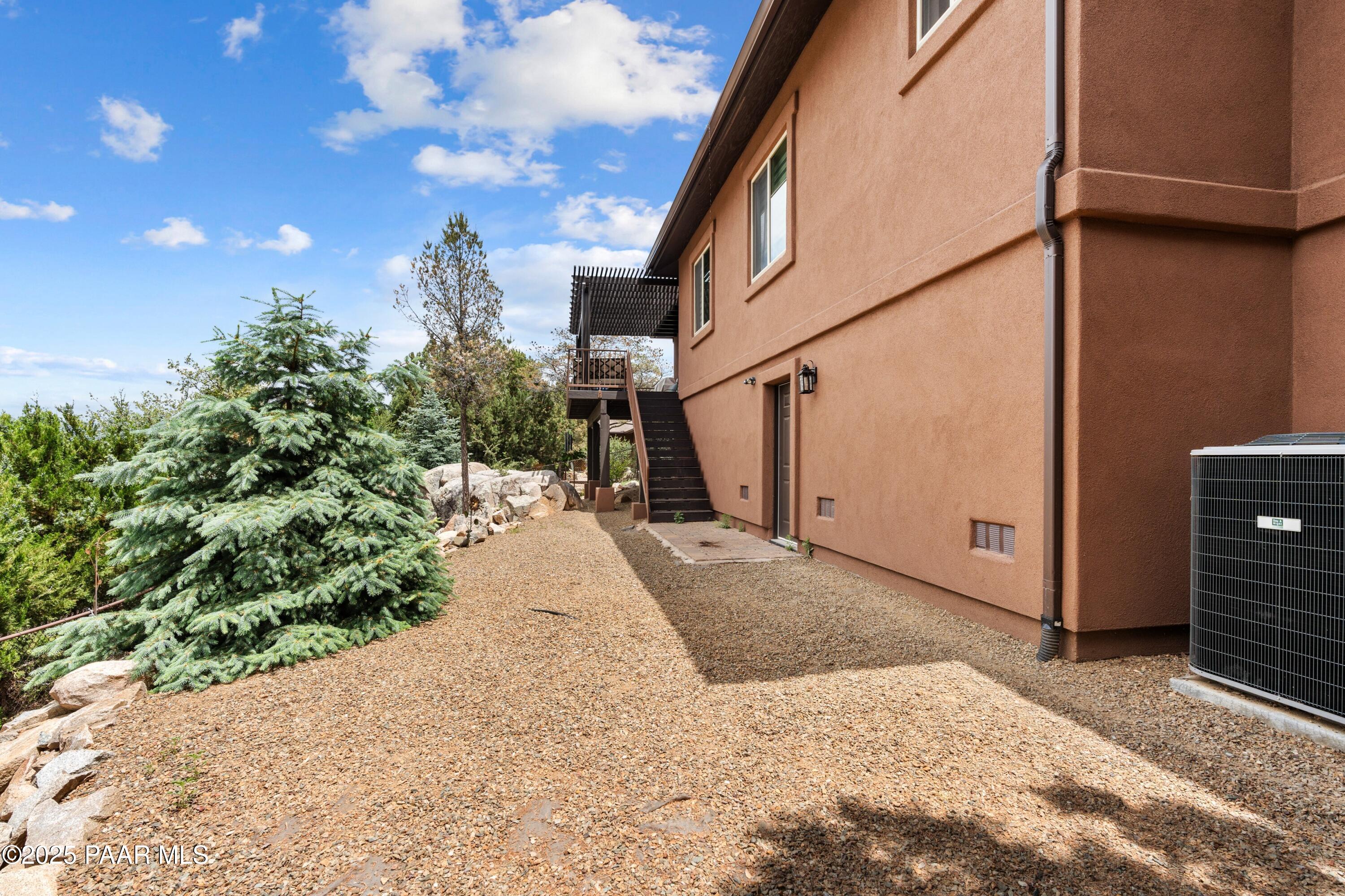 1468 Butte Road Prescott, AZ 86303 - Photo 26 of 31 a view of a pathway with a yard