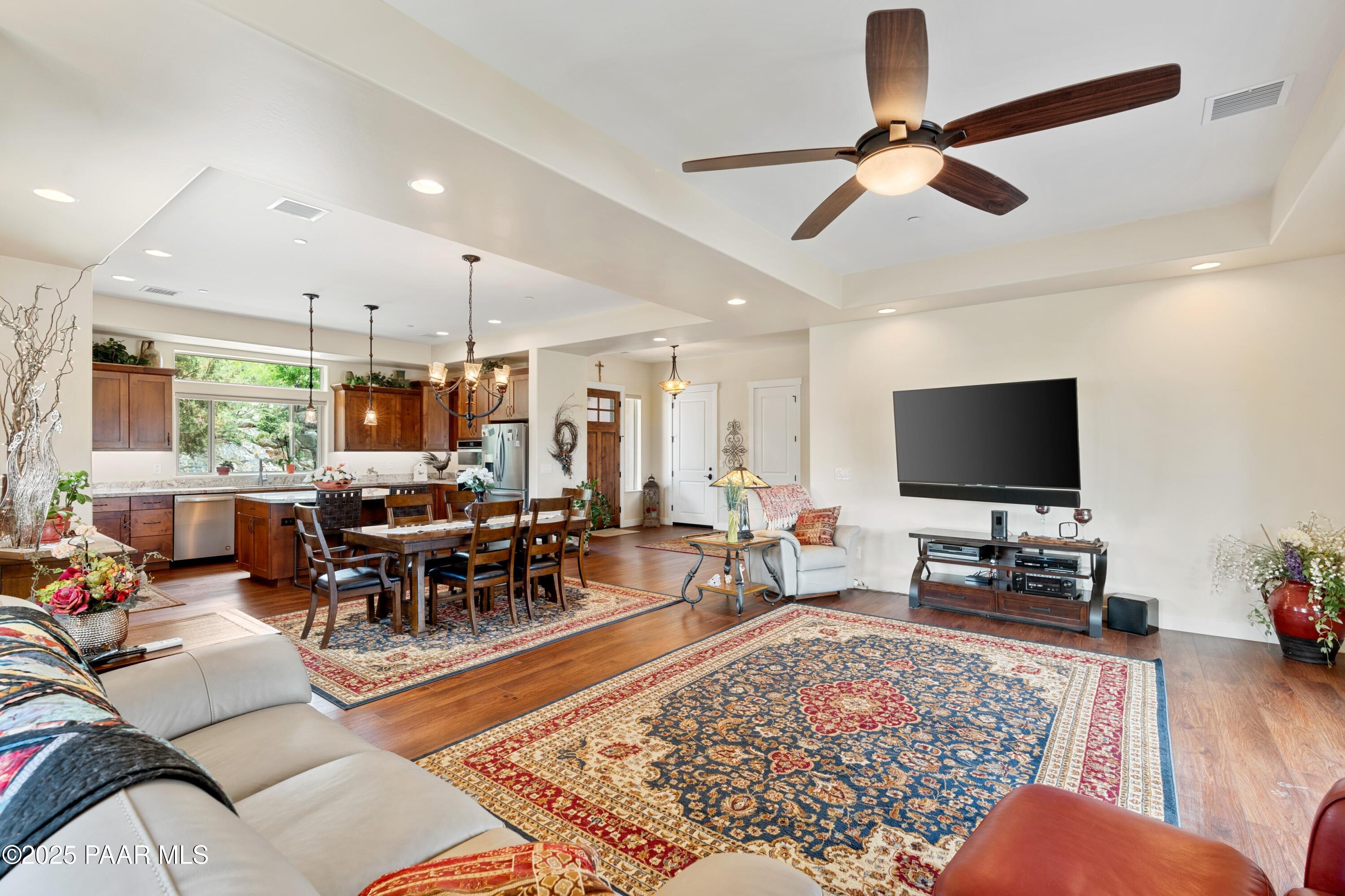 1468 Butte Road Prescott, AZ 86303 - Photo 5 of 31 a living room with furniture and a flat screen tv