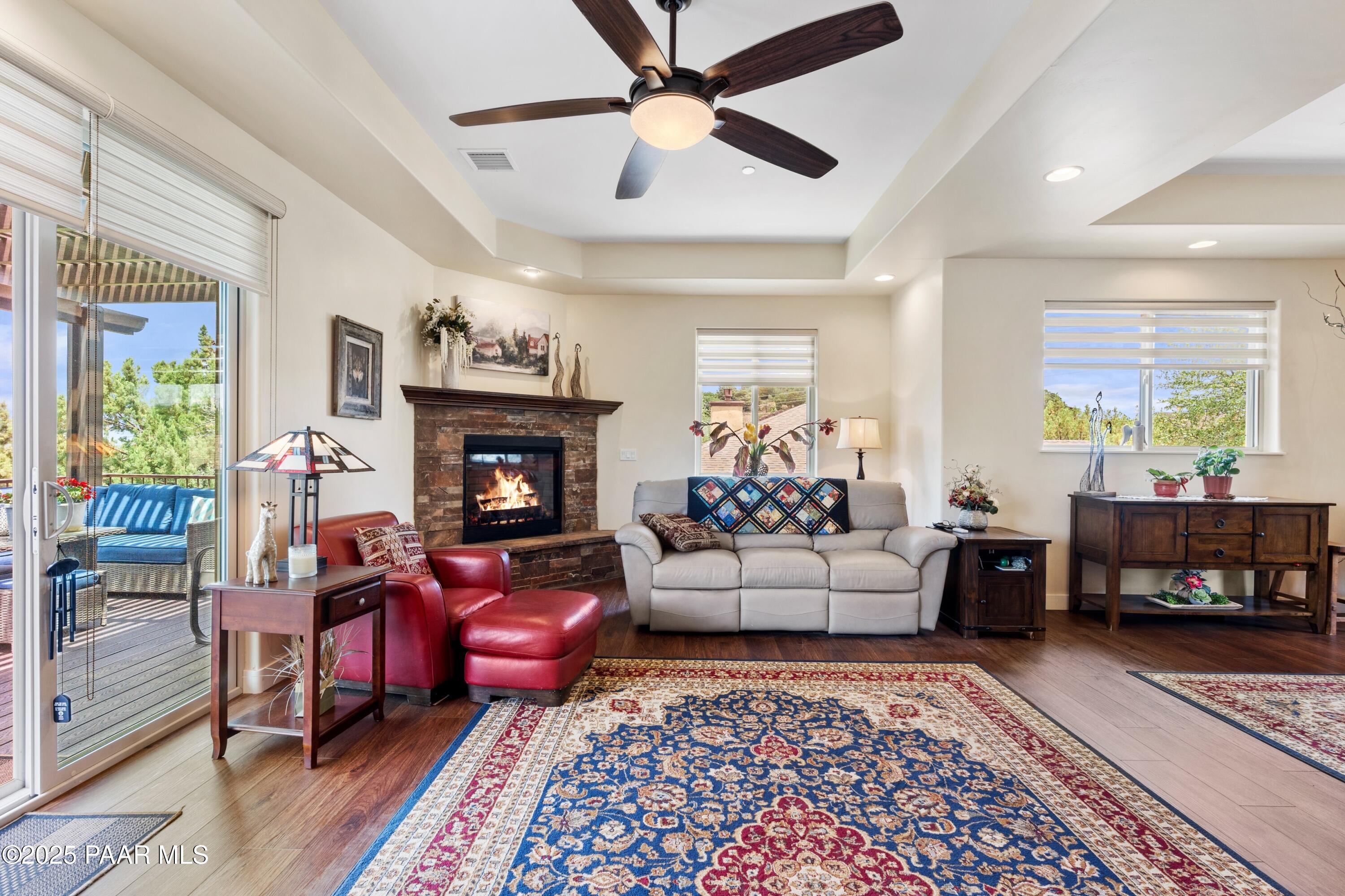 1468 Butte Road Prescott, AZ 86303 - Photo 7 of 31 a living room with furniture and a fireplace