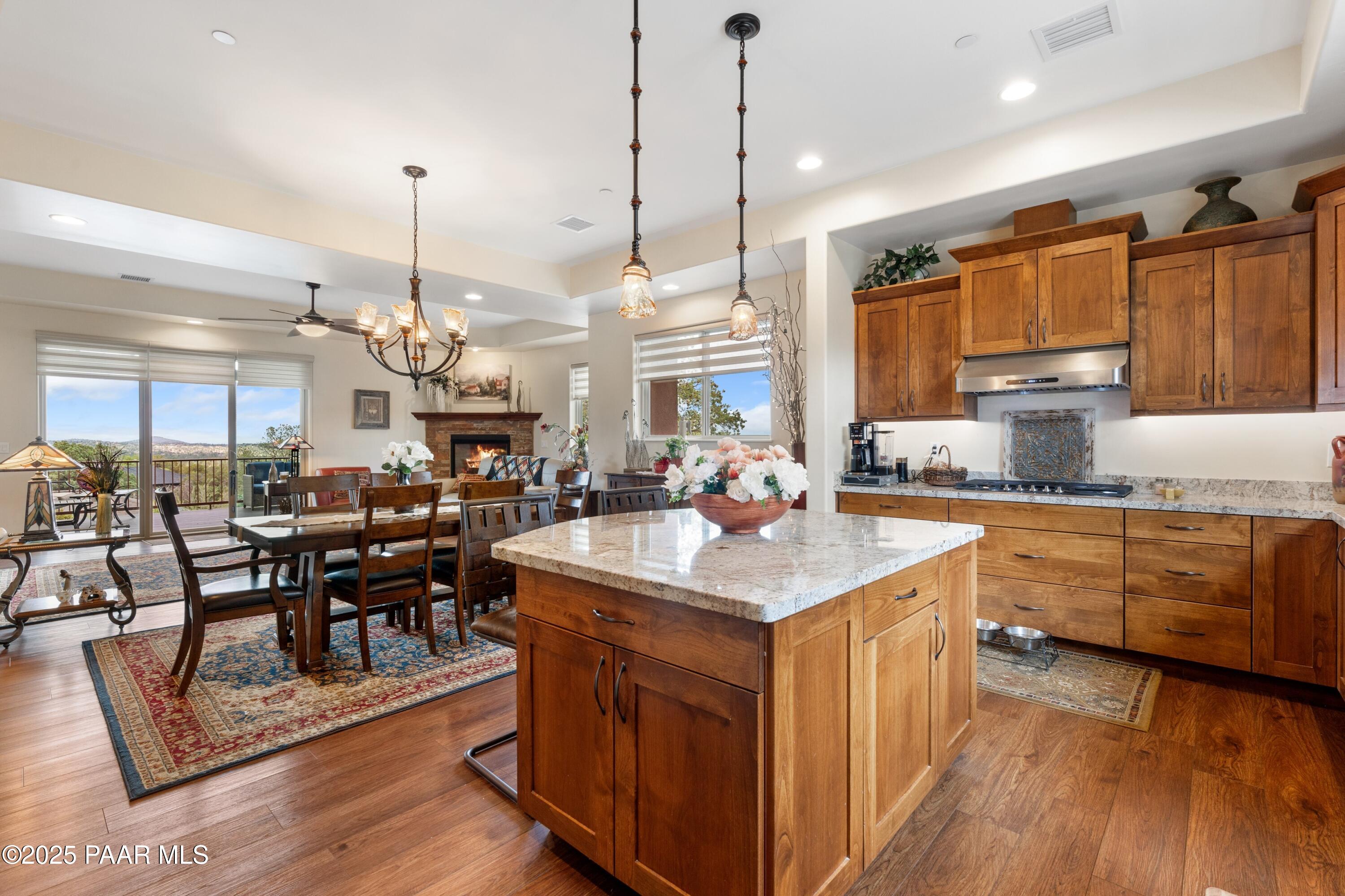 1468 Butte Road Prescott, AZ 86303 - Photo 10 of 31 a kitchen with sink stove and wooden floor