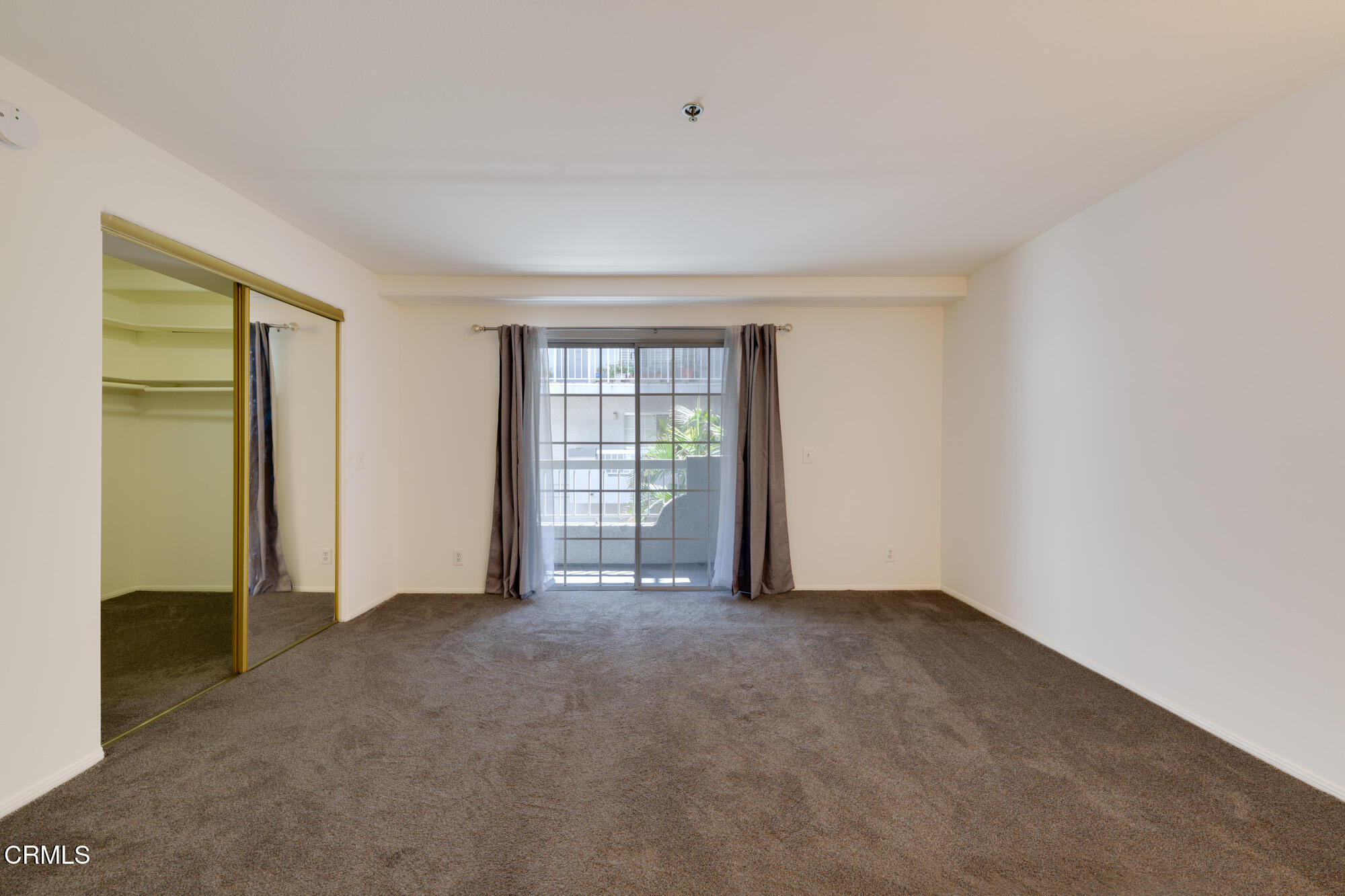 10925 Blix Street, Unit 102 Toluca Lake, CA 91602 - Photo 10 of 29 a view of an empty room with closet