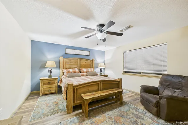 a bed room with a bed and a couch