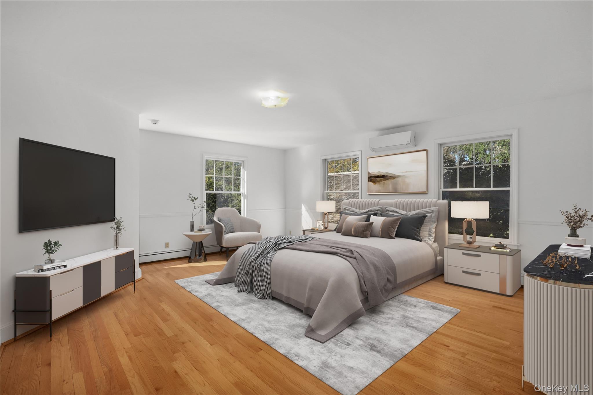 30 Knapp Road Pound Ridge, NY 10576 - Photo 24 of 38 a bedroom with a bed and flat screen tv