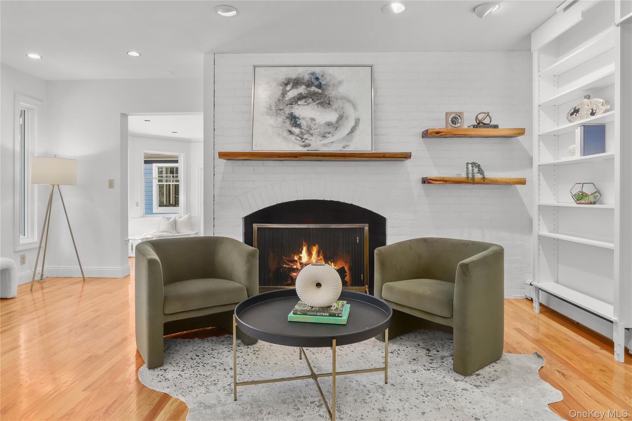 30 Knapp Road Pound Ridge, NY 10576 - Photo 6 of 38 a living room with furniture and a fireplace