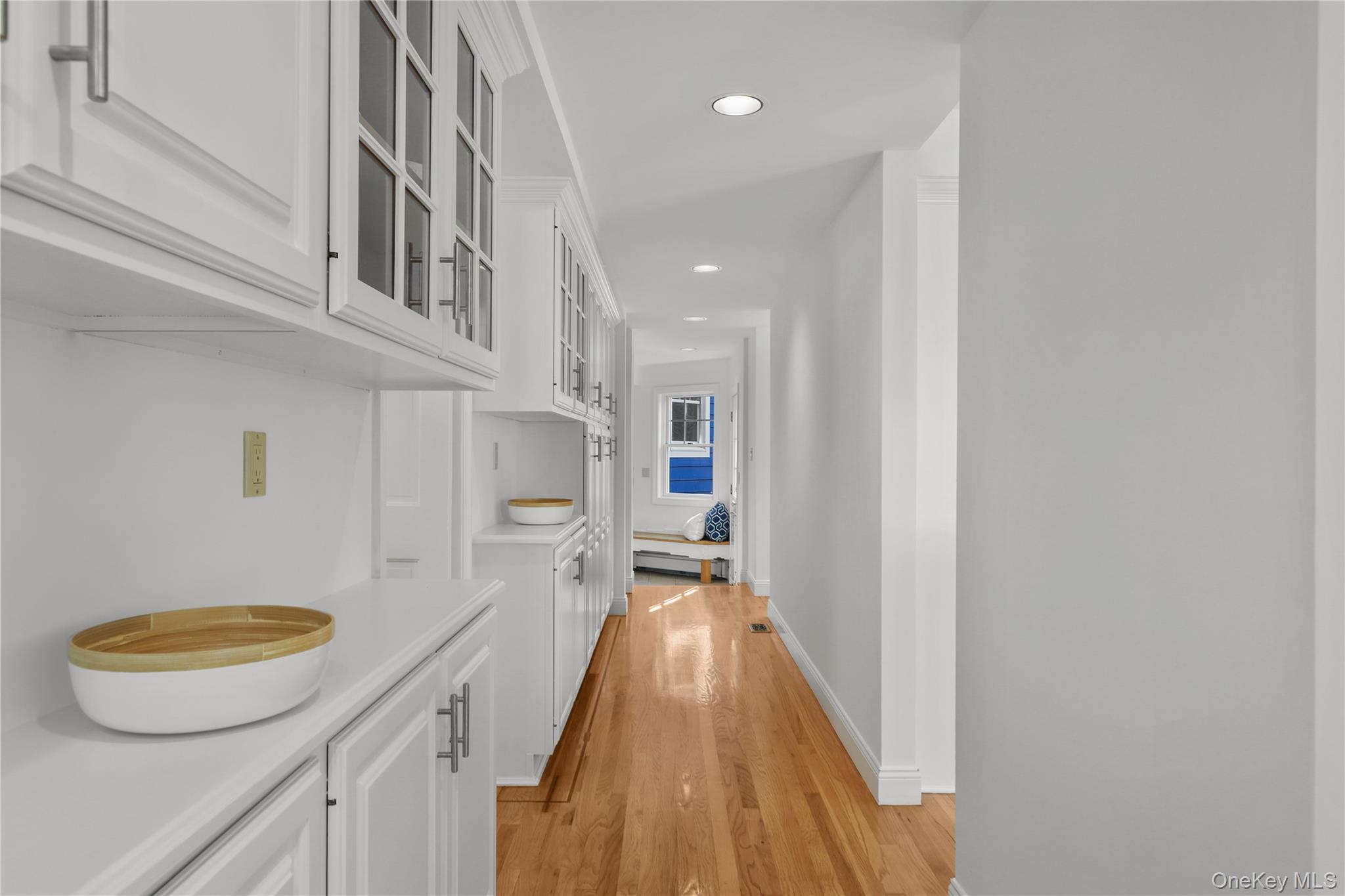 30 Knapp Road Pound Ridge, NY 10576 - Photo 10 of 38 a view of a bathroom with a sink and a wooden floor