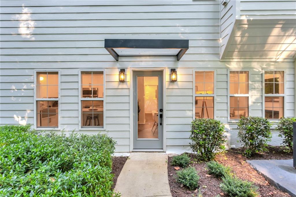 3882 The Ascent Northeast Atlanta, GA 30319 - Photo 41 of 56 a view of front door and porch with seating