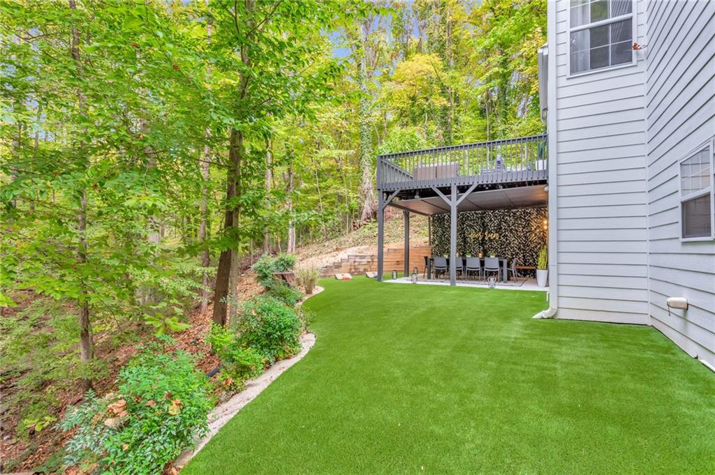3882 The Ascent Northeast Atlanta, GA 30319 - Photo 52 of 56 a view of a house with a backyard