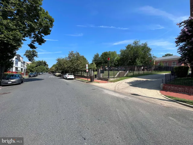 a view of a street with a houses