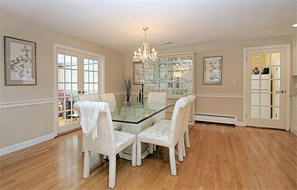 7 Blueberry Hill Road Weston, MA 02493 - Photo 8 of 29 a view of a dining room with furniture window and wooden floor