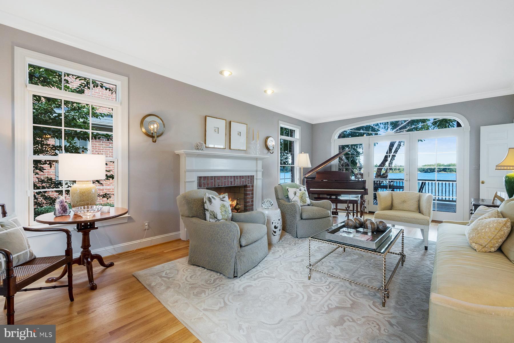 710 South River Landing Road Edgewater, MD 21037 - Photo 11 of 55 Living room has access to a waterside deck