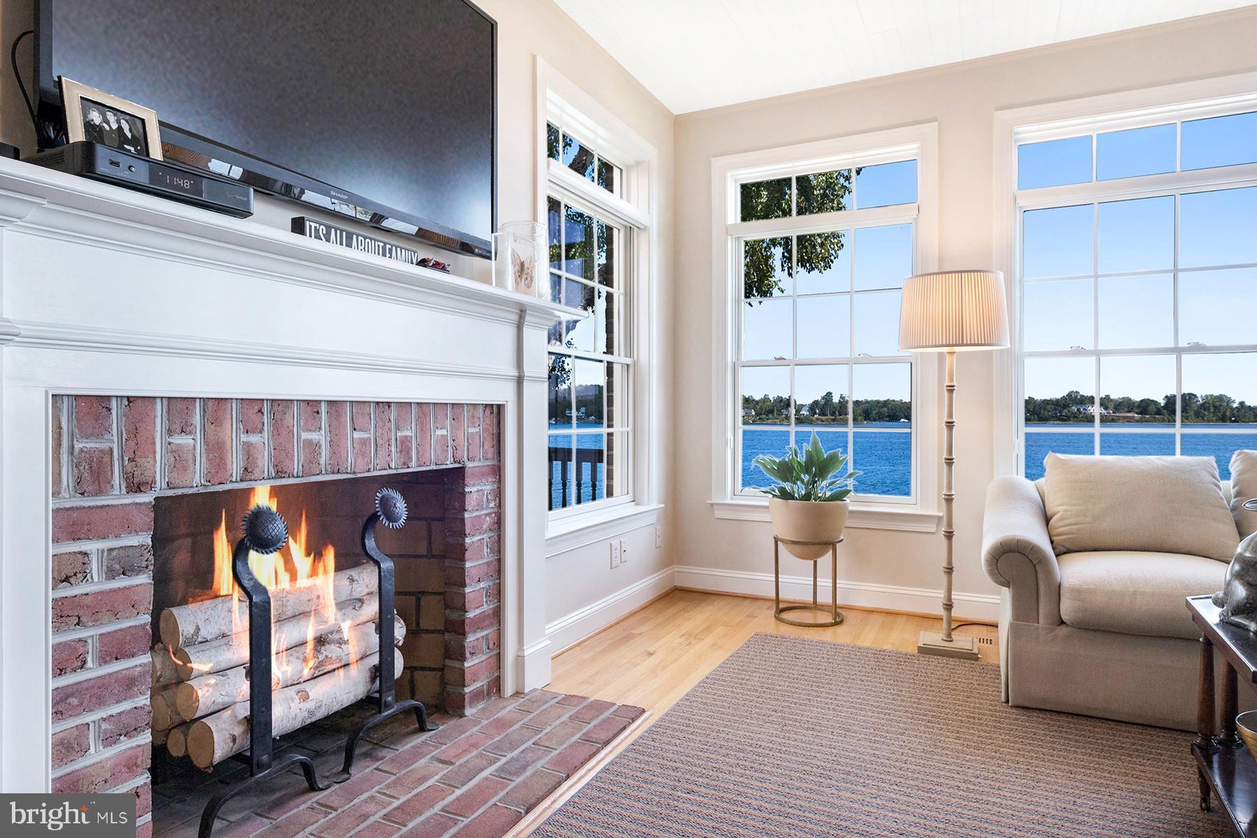 710 South River Landing Road Edgewater, MD 21037 - Photo 10 of 55 Family room with wood-burning fireplace