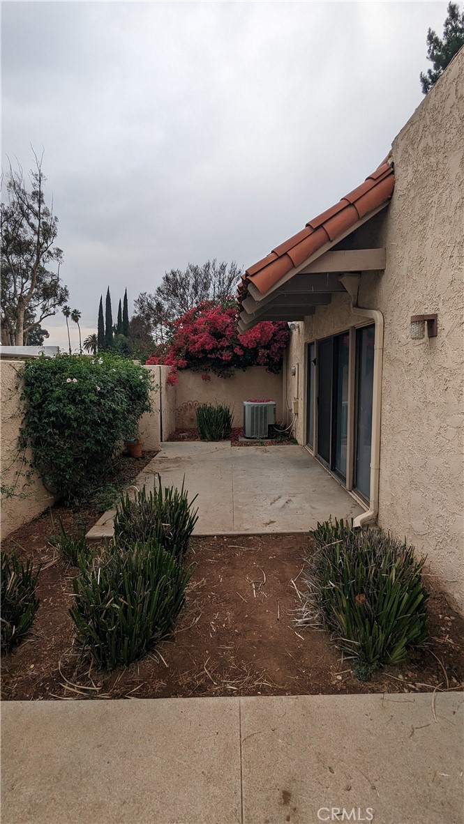 2645 Cortina Drive Riverside, CA 92506 - Photo 12 of 17 a view of a house with a yard