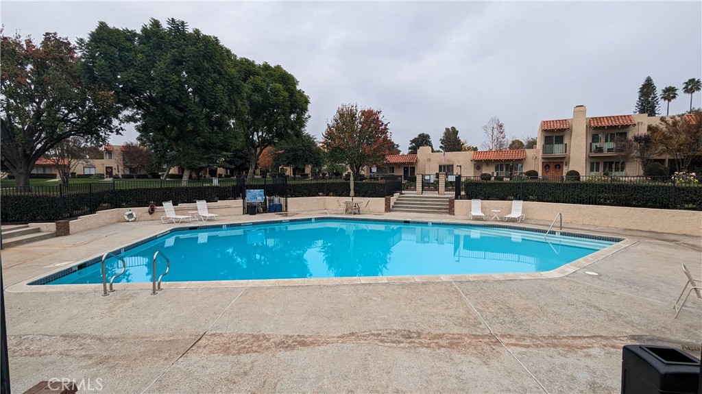 2645 Cortina Drive Riverside, CA 92506 - Photo 17 of 17 a view of a swimming pool with a patio