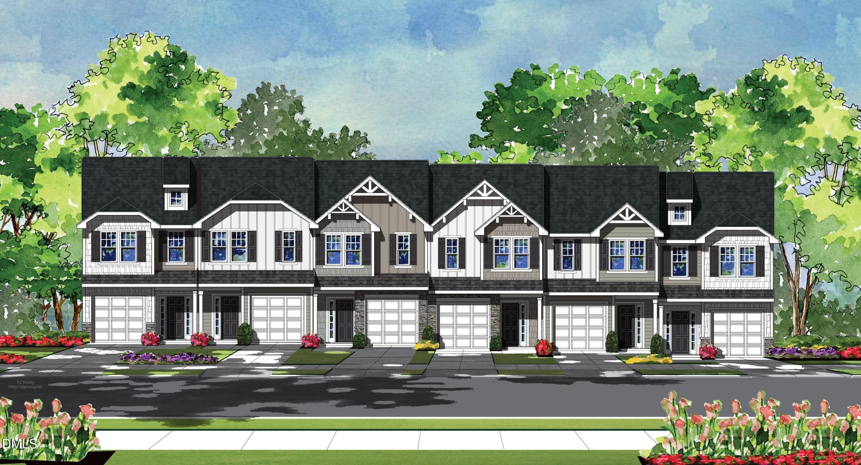 422 Morgan Brook Way Rolesville, NC 27571 - Photo 6 of 6 a front view of a residential apartment building with a yard