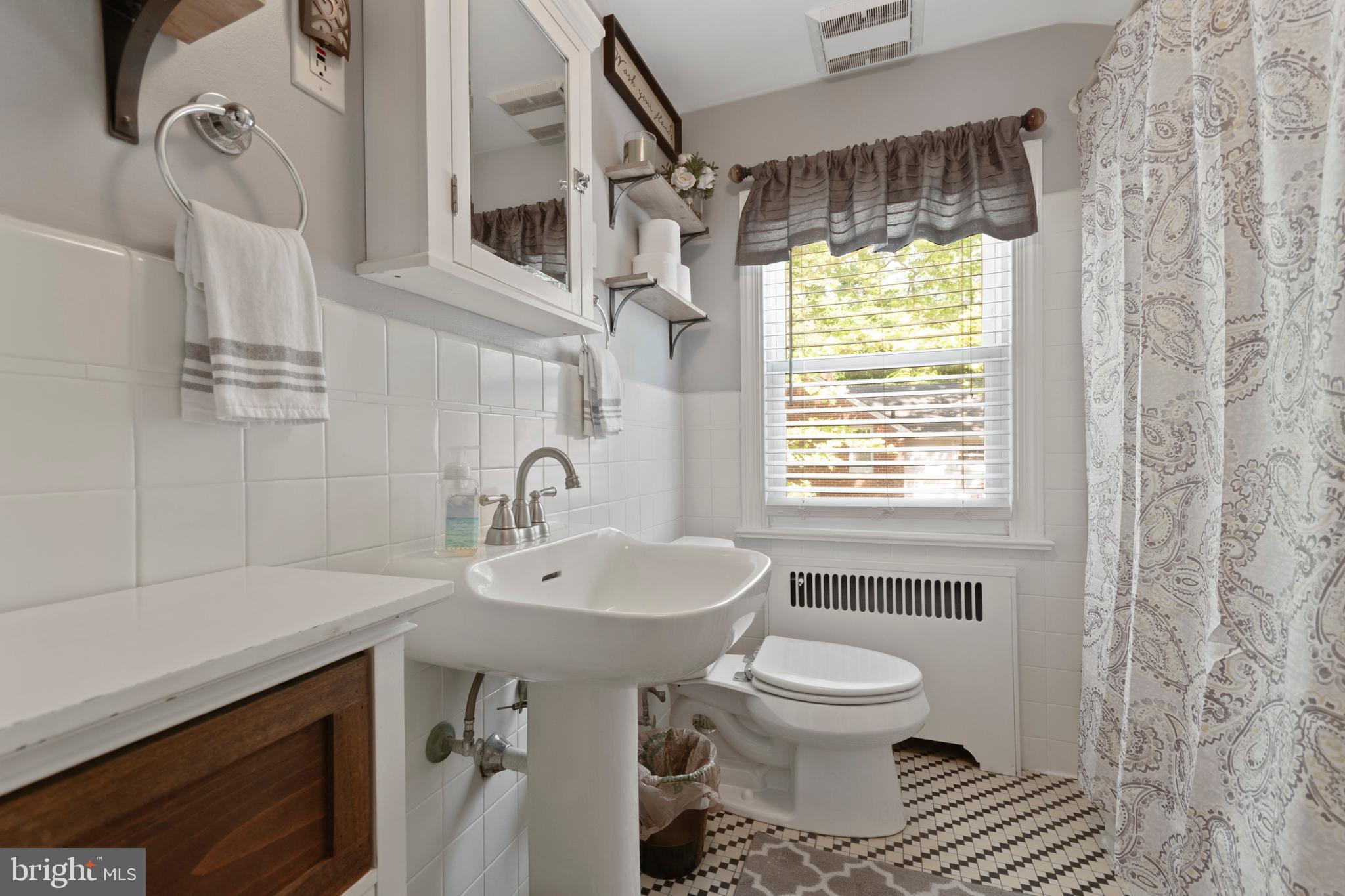 224 Woodward Road Media, PA 19063 - Photo 21 of 28 Updated bathroom with tub