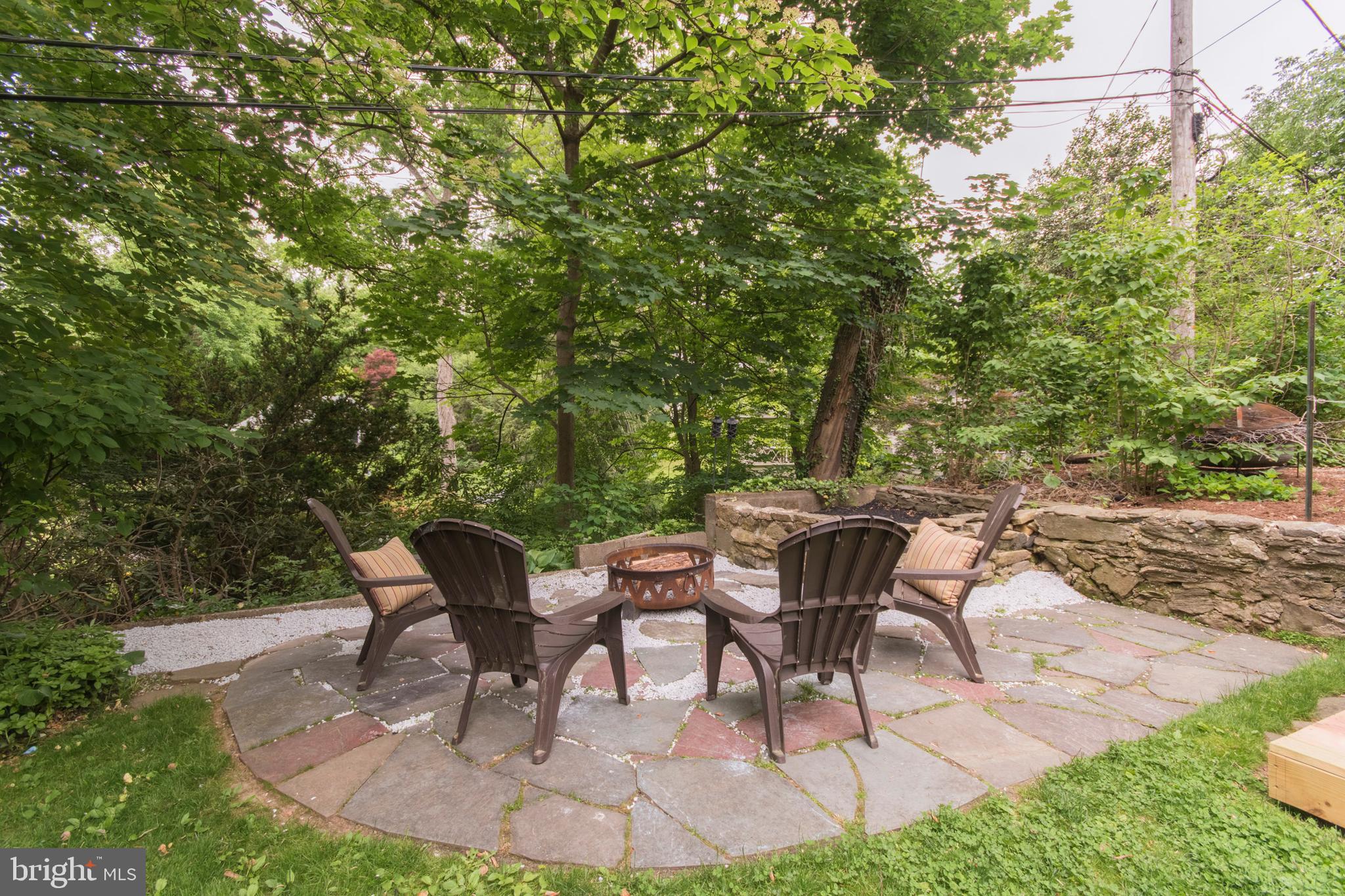 224 Woodward Road Media, PA 19063 - Photo 24 of 28 Fire pit with slate pavers