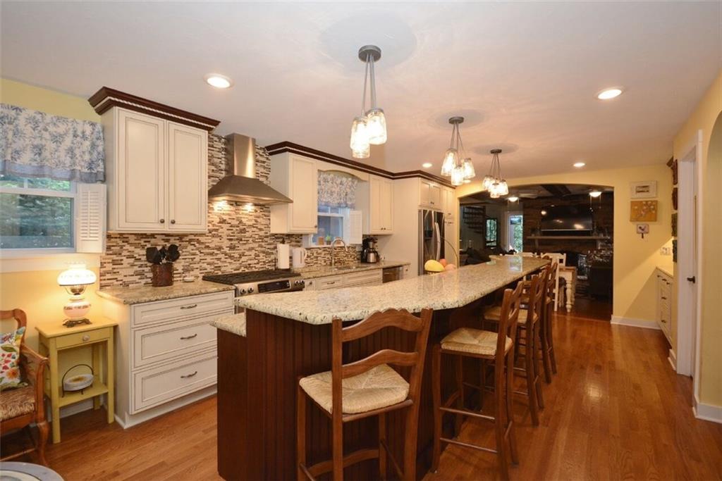 3241 Comanche Road Pittsburgh, PA 15241 - Photo 2 of 25 Kitchen with expansive bar and counter tops