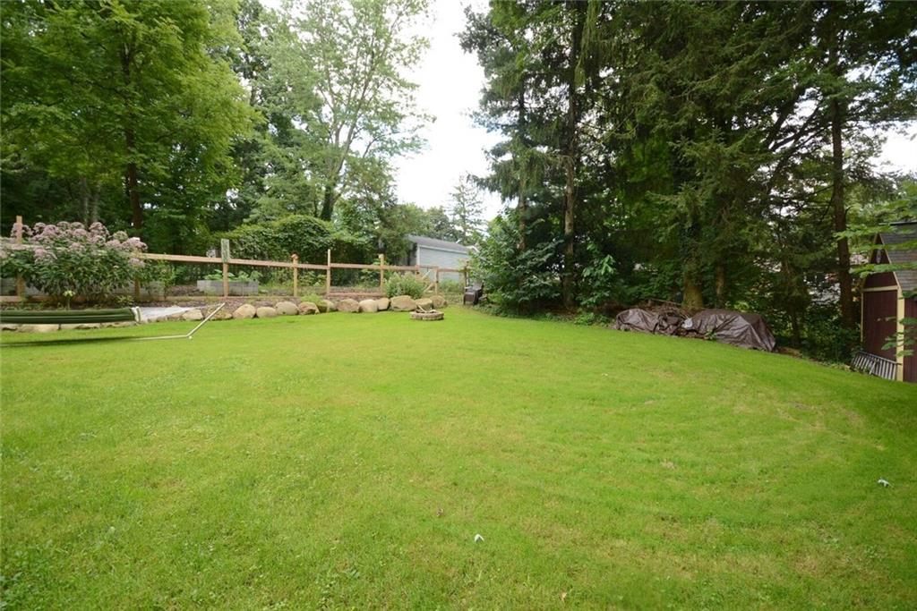 3241 Comanche Road Pittsburgh, PA 15241 - Photo 21 of 25 Back yard with extensive plantings and separate area for gardening.