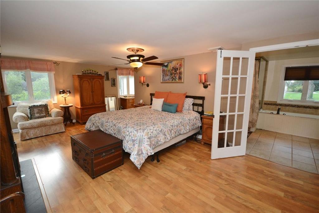 3241 Comanche Road Pittsburgh, PA 15241 - Photo 6 of 25 Large master bedroom with private balcony and spa like master bathroom and fireplace.