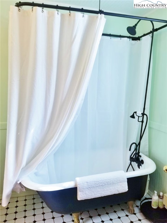 17 Grey Fox Ridge Road Banner Elk, NC 28604 - Photo 13 of 37 a bathroom with a sink and a bathtub