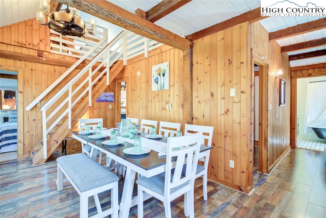 17 Grey Fox Ridge Road Banner Elk, NC 28604 - Photo 18 of 37 a view of a dining room with furniture and wooden floor