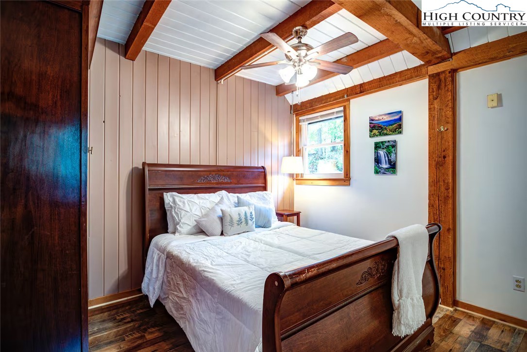 17 Grey Fox Ridge Road Banner Elk, NC 28604 - Photo 21 of 37 a bedroom with a bed and a window