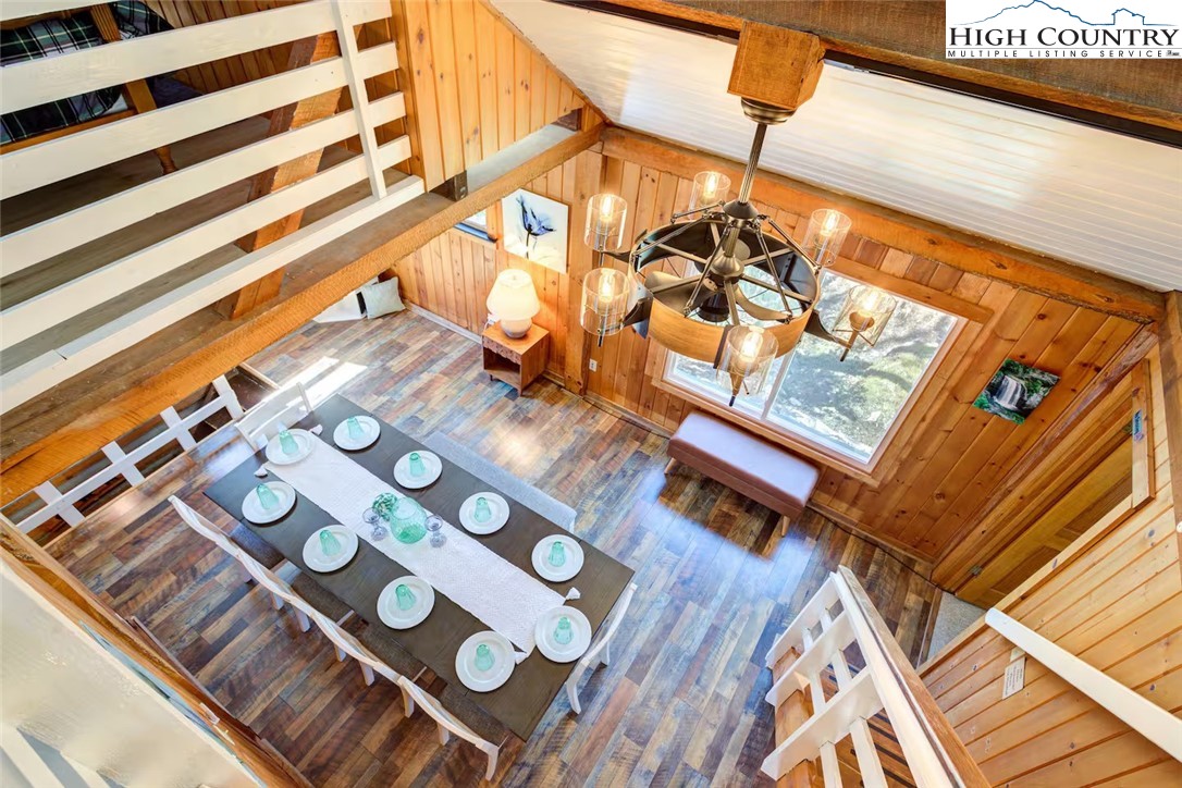17 Grey Fox Ridge Road Banner Elk, NC 28604 - Photo 24 of 37 a living room with wooden floor and furniture