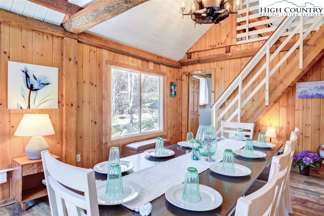 17 Grey Fox Ridge Road Banner Elk, NC 28604 - Photo 25 of 37 a view of a dining room with furniture a rug and wooden floor