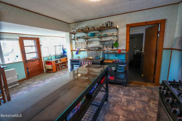 a room with furniture and a window