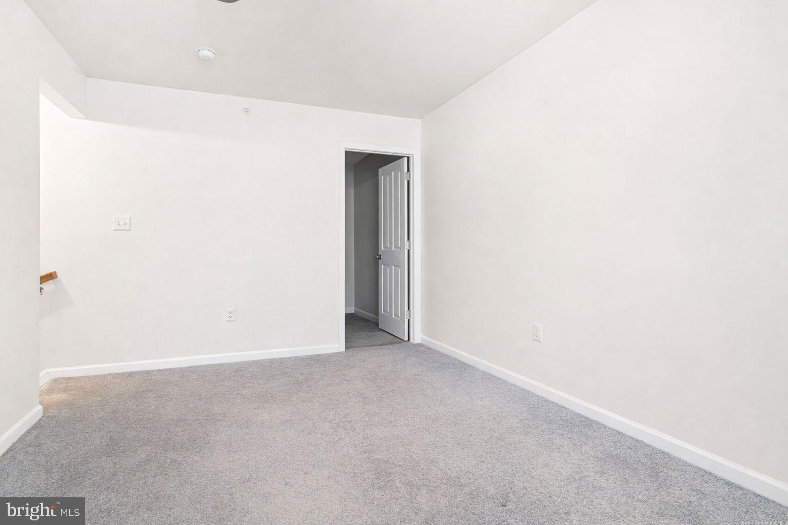 303 Ross Court Wyncote, PA 19095 - Photo 23 of 26 Spacious top‑floor bedroom with storage