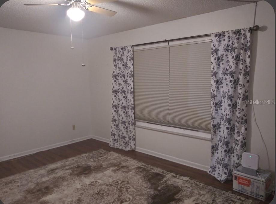 Undisclosed Address Ocala, FL 34472 - Photo 12 of 21 a bathroom with a shower curtain and a window