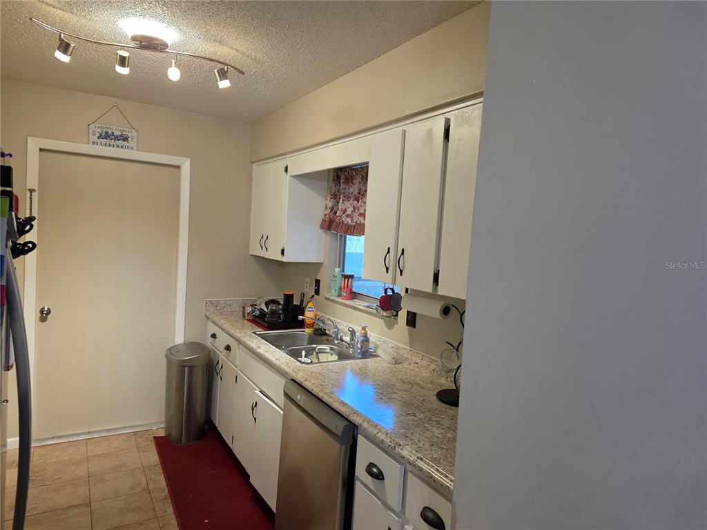 Undisclosed Address Ocala, FL 34472 - Photo 14 of 21 a kitchen with a stove and a refrigerator