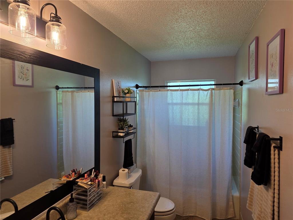 Undisclosed Address Ocala, FL 34472 - Photo 9 of 21 a bathroom with a shower