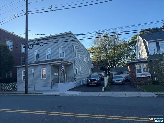 a view of a building on a street