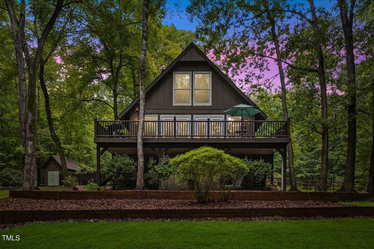 6713 Laurdane Road Raleigh, NC 27613 - Photo 2 of 47 a front view of a house with garden